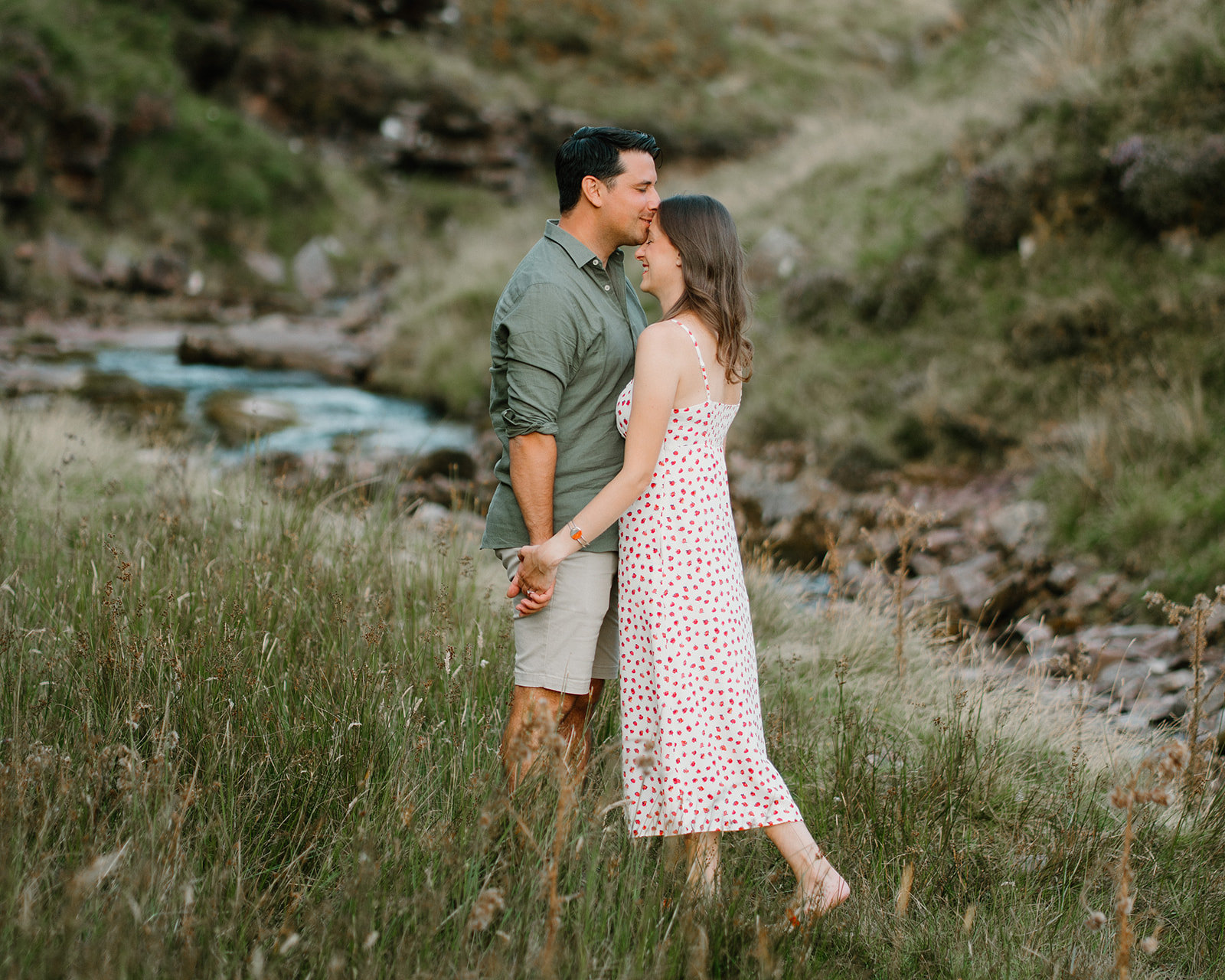 Tara and Matthew by the waterfall
