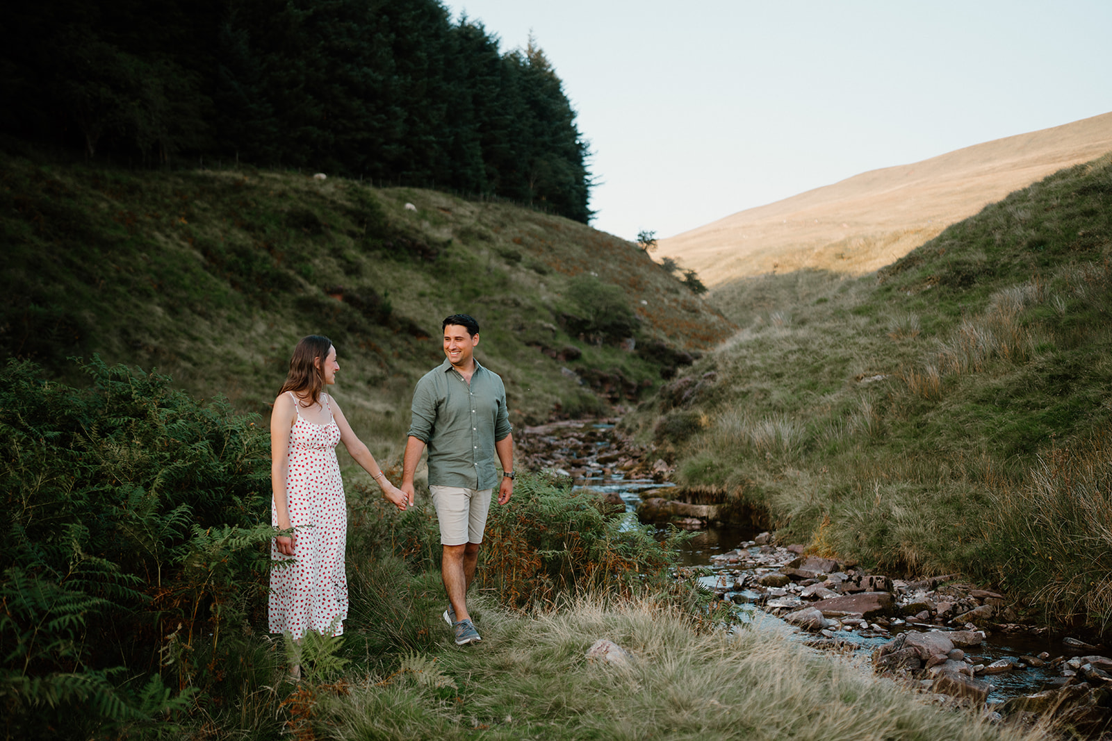 Tara and Matthew walking in the valley